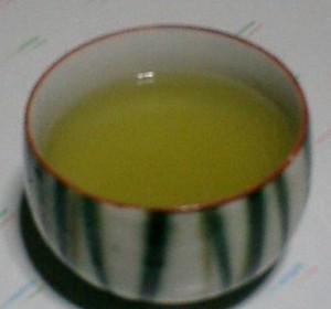 A bowl of Green Tea for Budwig Diet ready to drink without sugar of milk