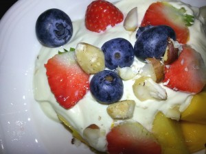 Budwig quark and linseed oil (FOCC) muesli with honey, ground linseed, fruit, berries and chopped nuts,