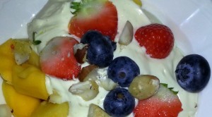 Fruit and homemade quark cottage cheese. with Flax Farm cold-pressed linseed oil