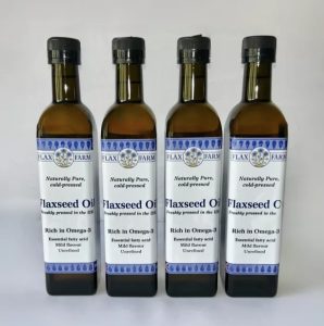 A 4-pack Dark glass bottles of Cold-pressed Flaxseed Oil-725x1024c